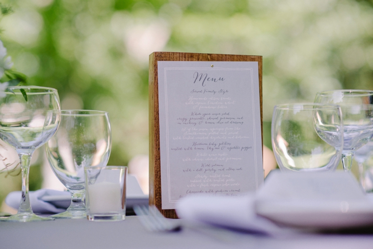wedding menu on wooden block