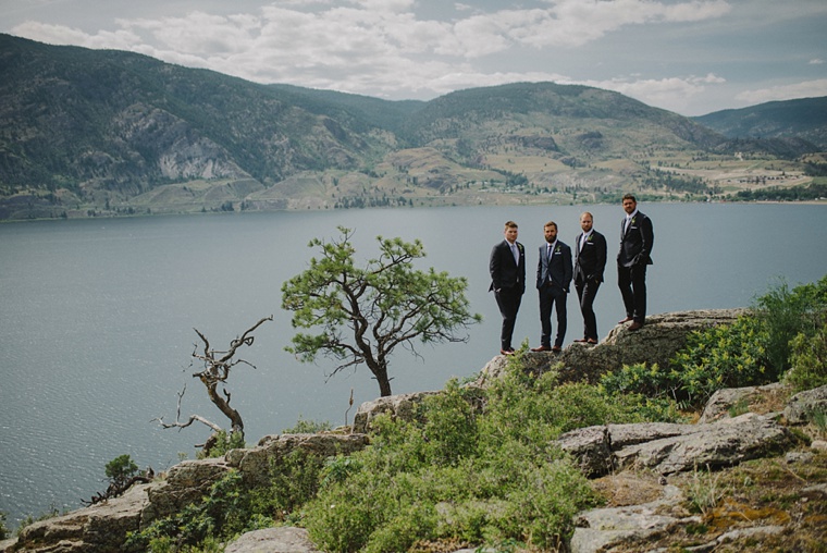 epic groomsmen photo on mountain